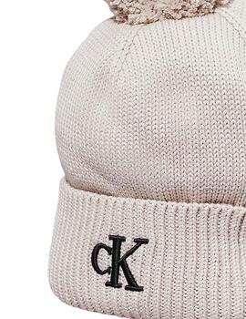 Gorro Calvin Klein beige con pompón